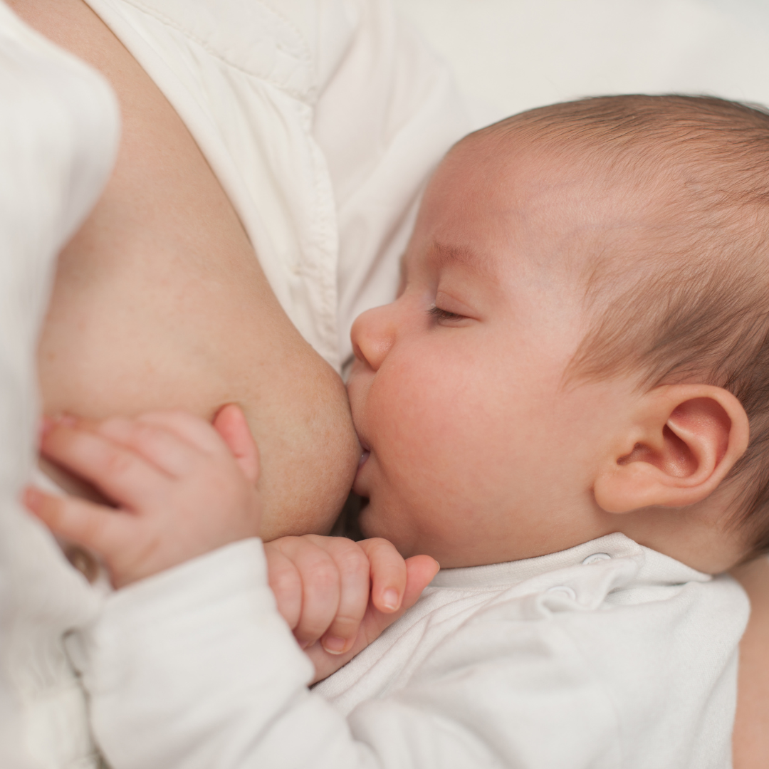 mother breastfeeding baby
